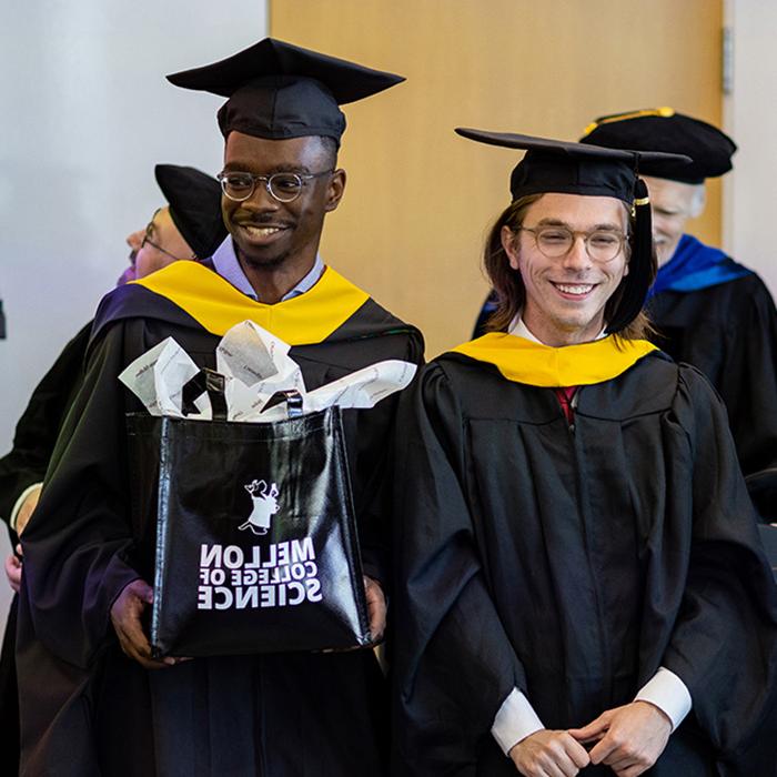 Student walks in commencement